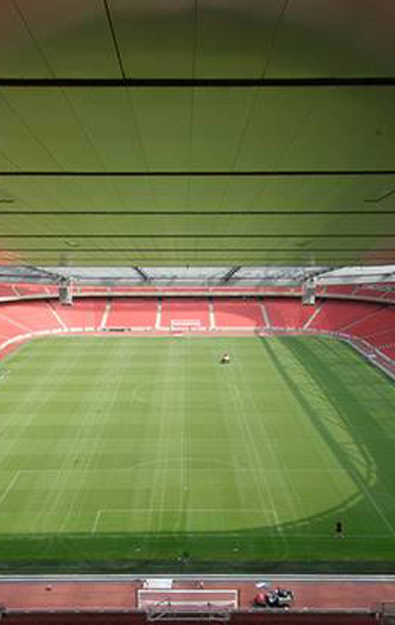 Panoramic view of Emirates Stadium, showcasing its vast seating capacity